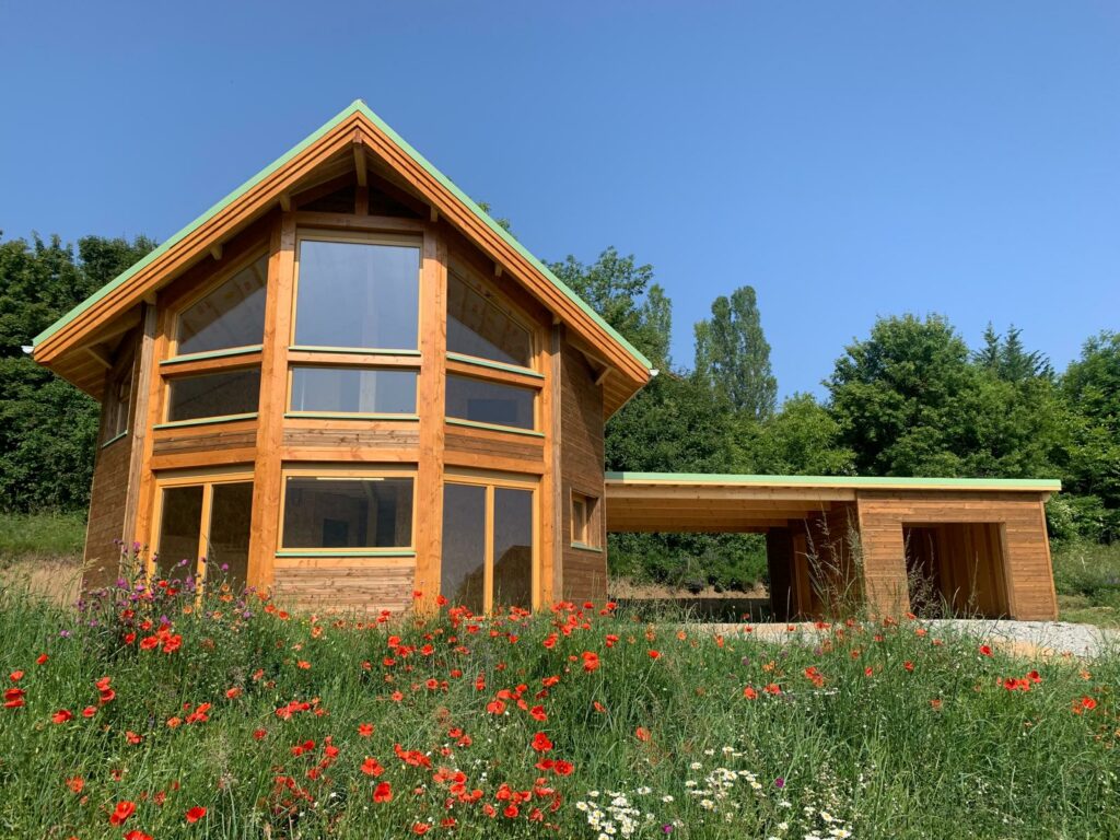 Mur rideau sur une maison ossature bois